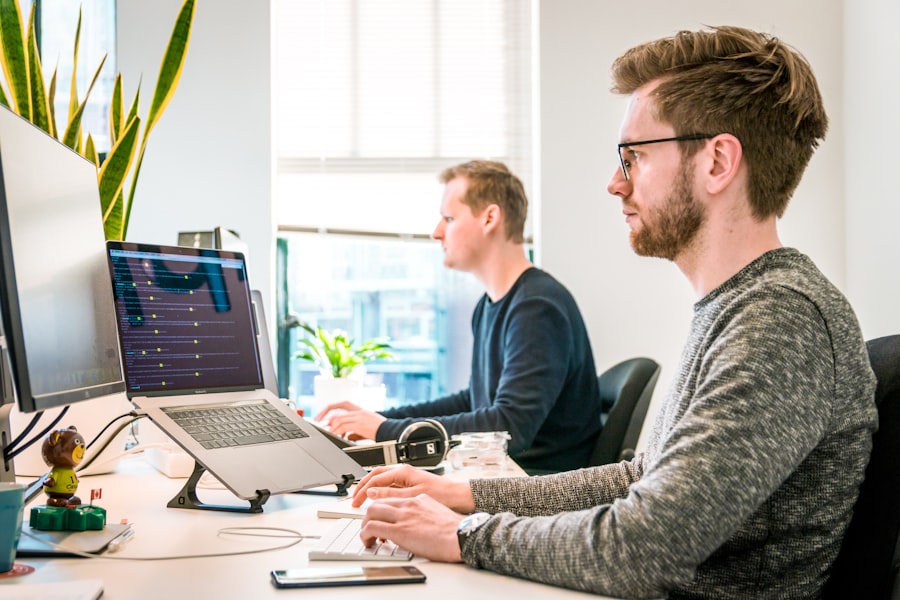 Developers working together at their screens